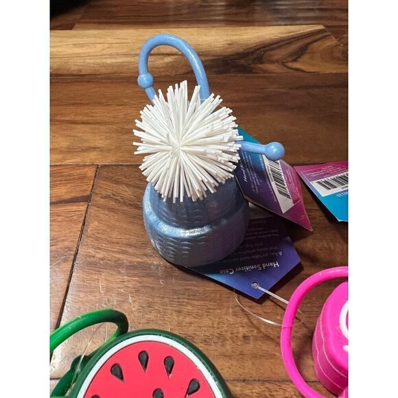 Lot of 6 hand sanitizer cases.   Good vibes, cupcake, penguin, melon - Picture 3 of 7